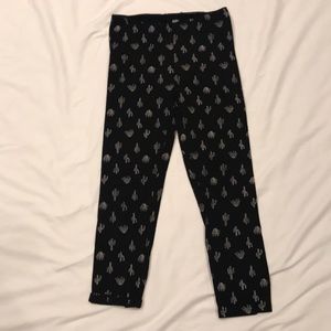 Girls black leggings with cactus print.